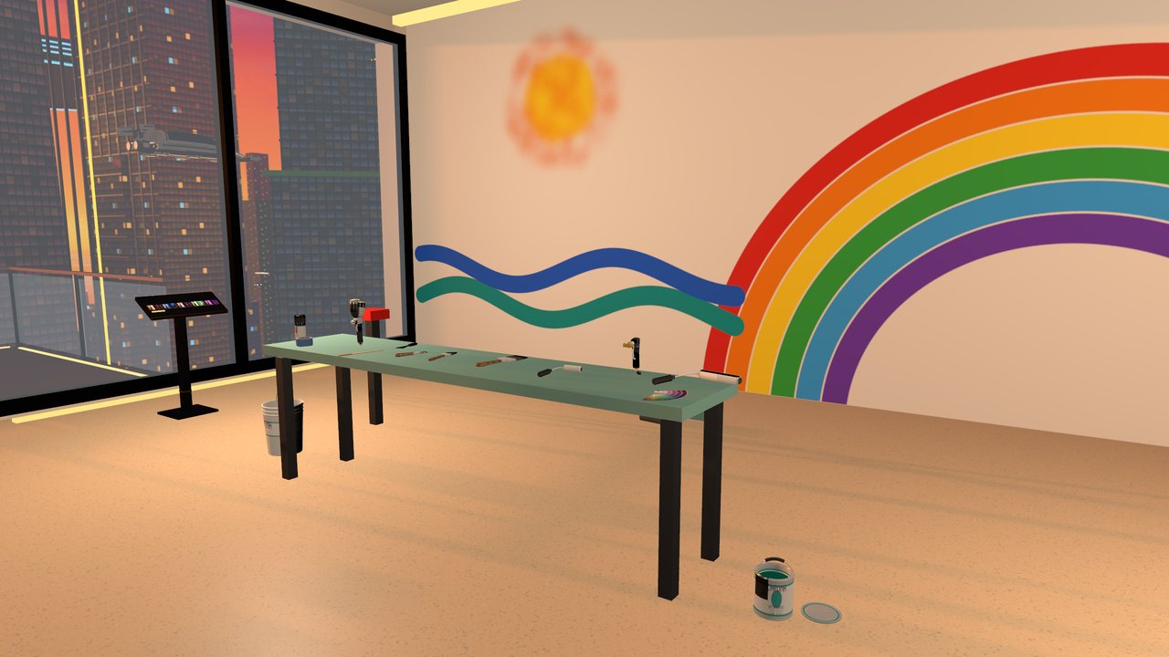 The paint table in front of a rainbow mural